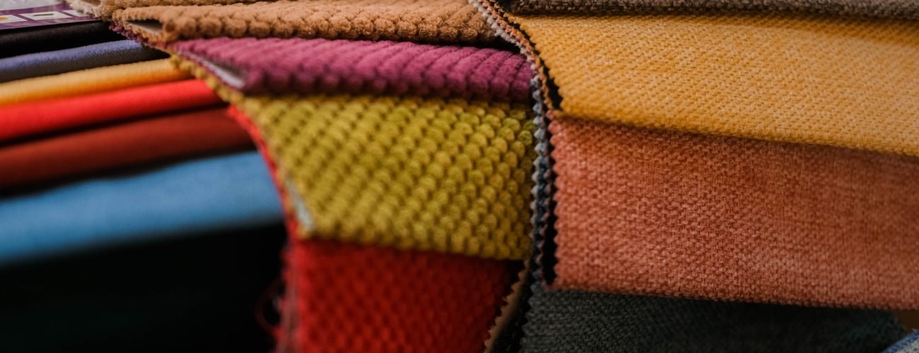Colorful samples of upholstery fabrics for upholstered furniture.